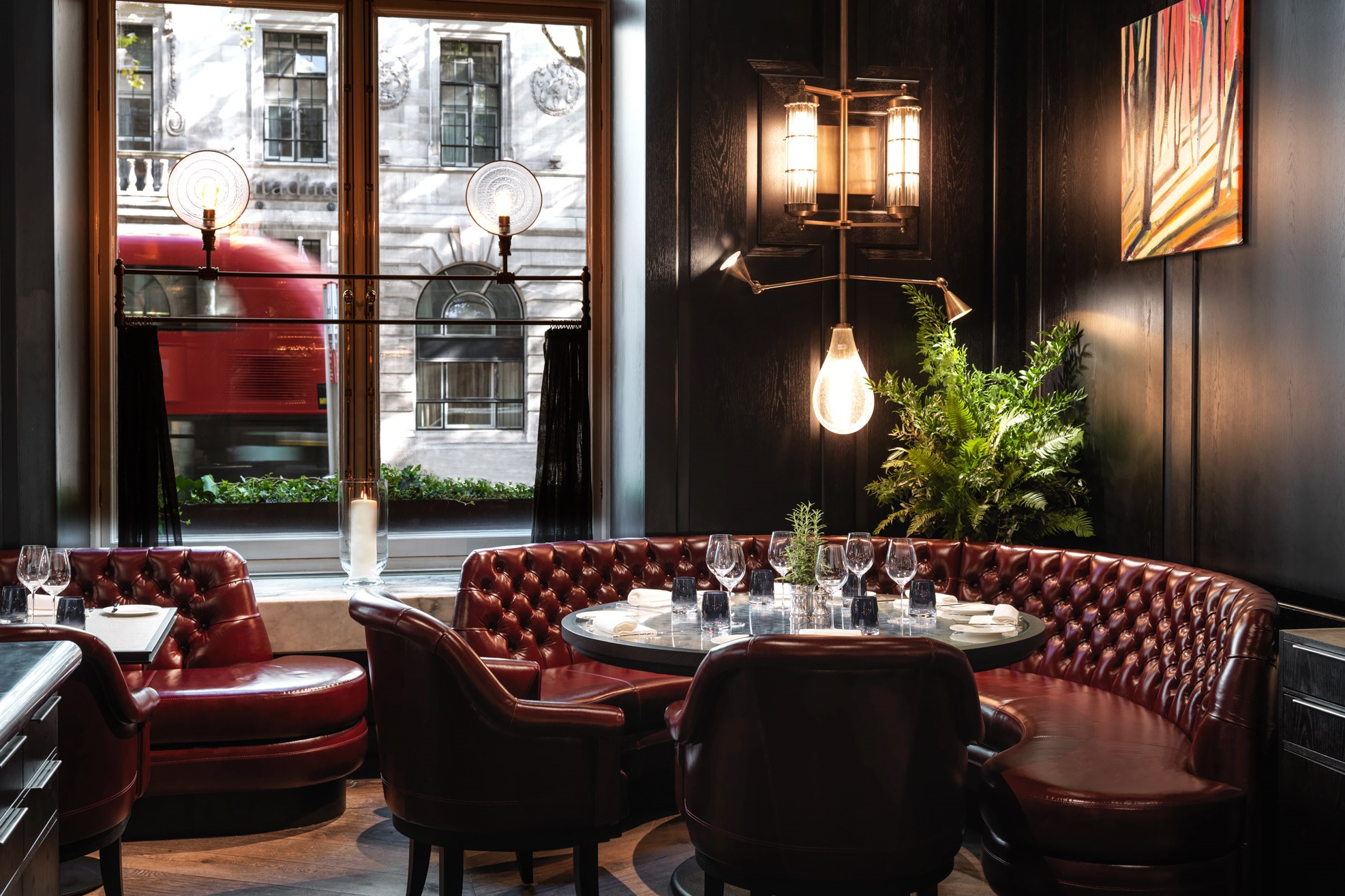 Cosy seating area beside a large window in Kerridge’s Bar & Grill, offering natural light from London and a comfortable dining experience